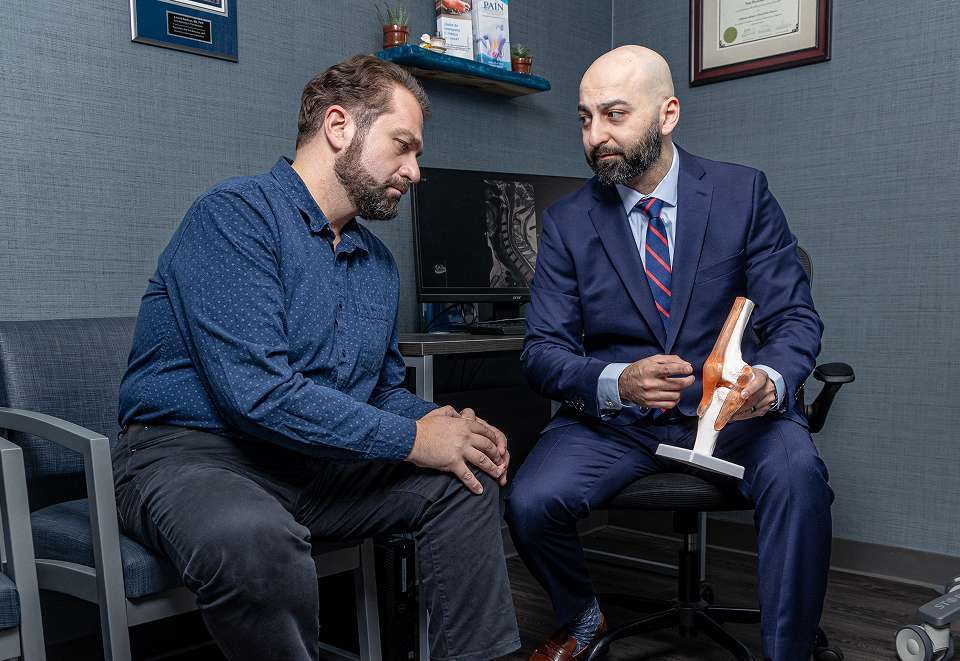 Stem Cell Therapy | Doctor Checking Patients Knee