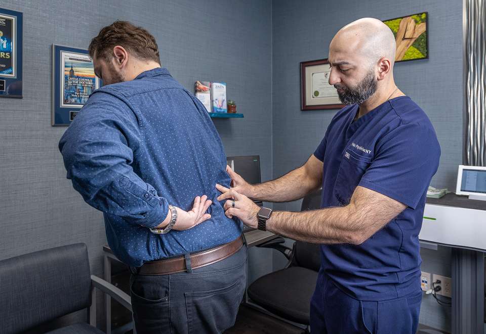 Stem Cell Therapy | Doctor Diagnosing Back Pain Cause