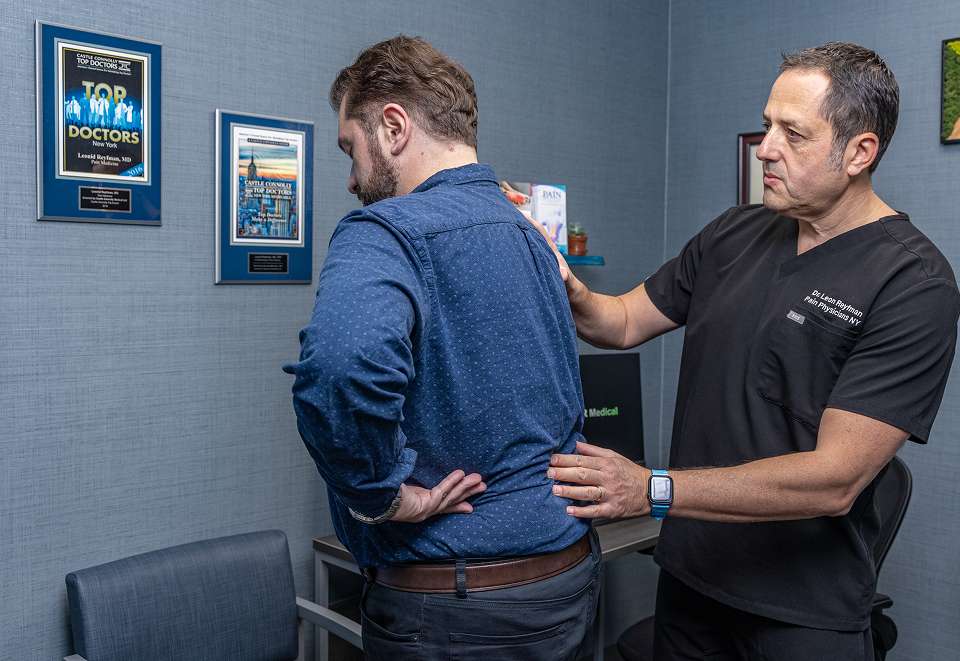 Stem Cell Therapy | Doctor Diagnosing Back Pain Cause