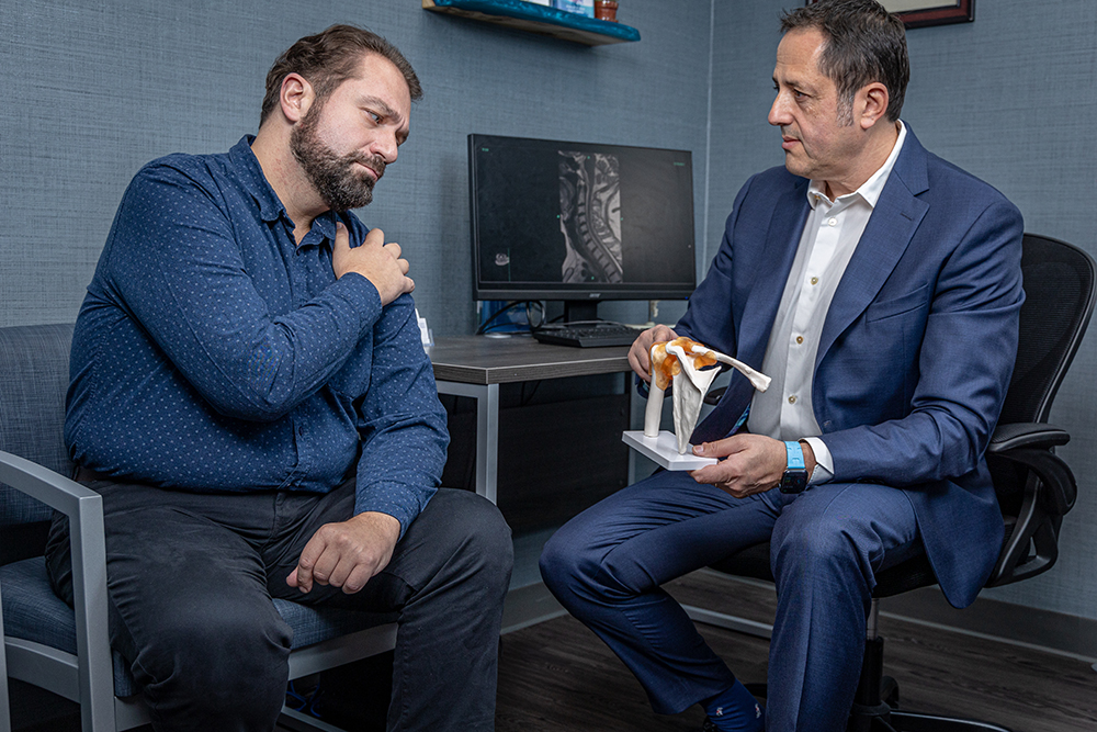 shoulder pain consultation with Dr. Reyfman, MD